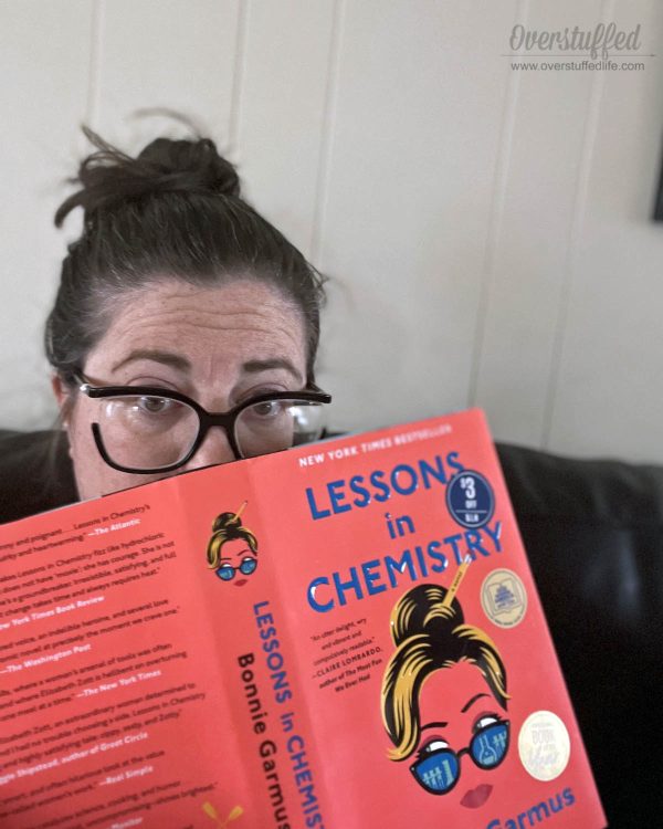 Mom reading book: Lessons in Chemistry by Bonnie Garmus