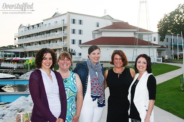 5 40-something women standing at the marina on Mackinac Island.